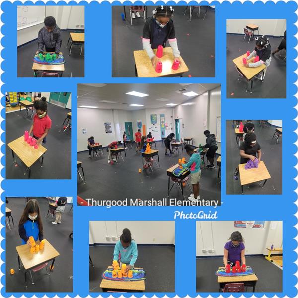 Thurgood Marshall Elementary students in a stacking exercise